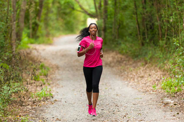 African American Woman Runner Jogging Outdoors – Fitness, People