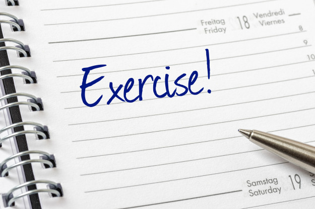 Exercise written on a white calendar page